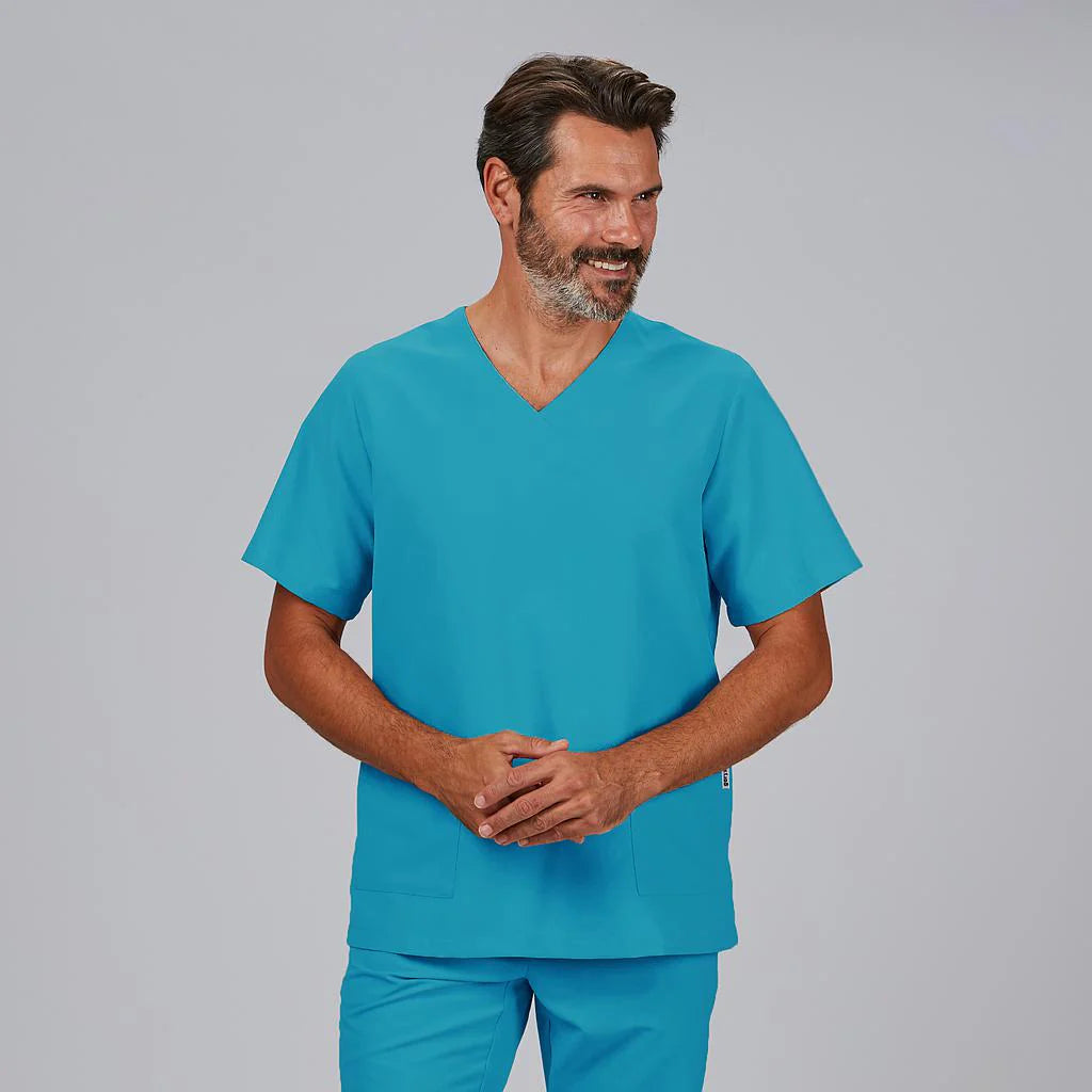 609600-115 - BLUSA UNISEX NEREA TURQUESA