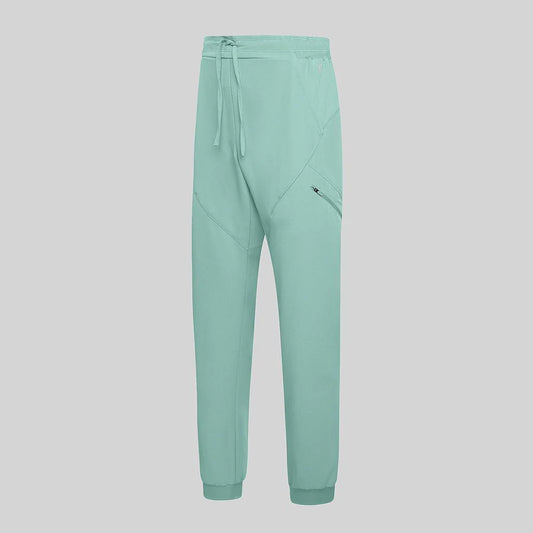 700074-143 - PANTALON JOGGER UNISEX AGUA MARINA